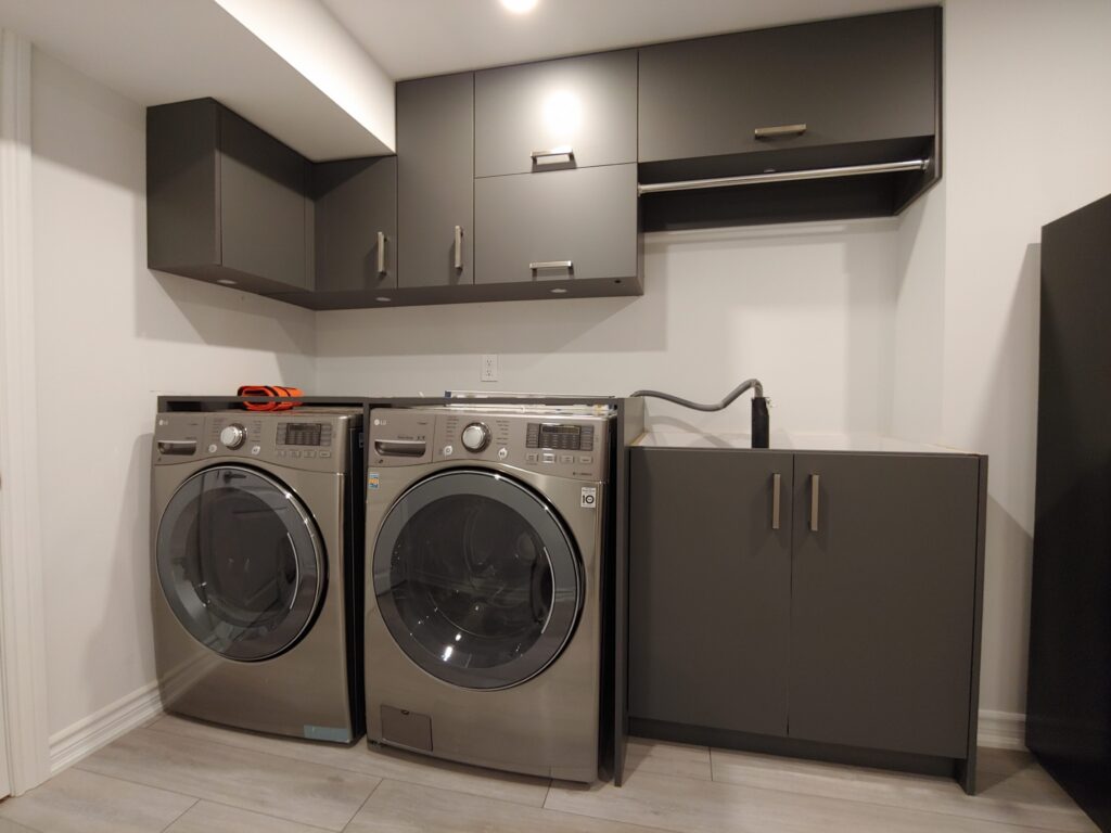basement laundry room with custom storage cabinets - cabinets designs maple